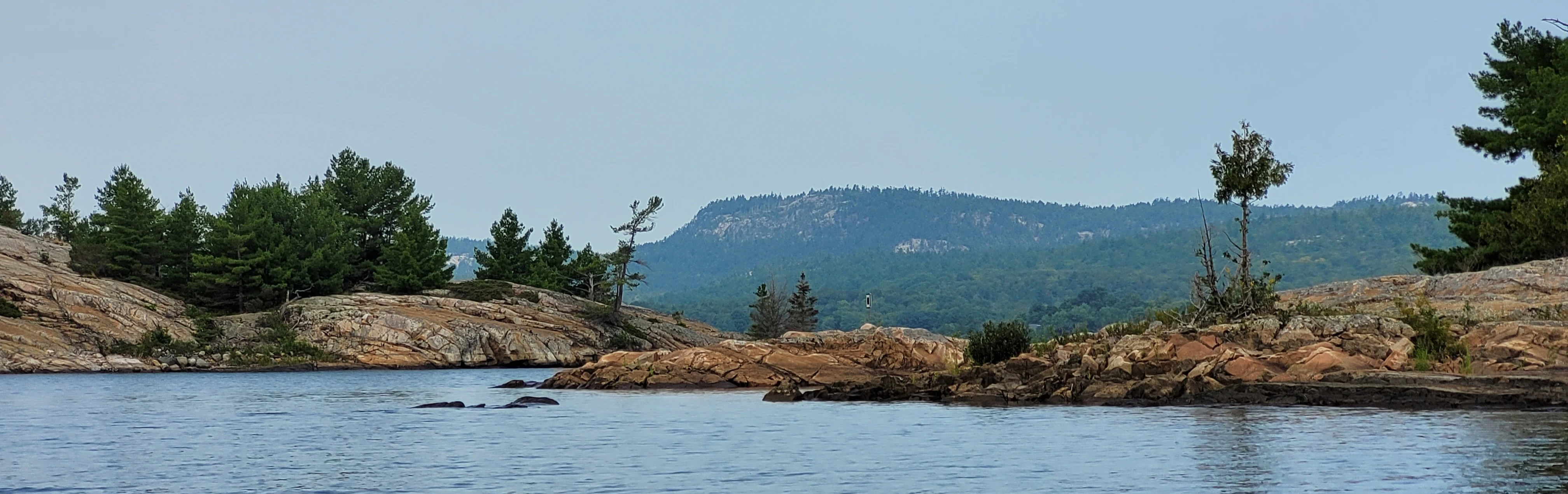 Pink Granite Rocks in Lake Hurons thirty thousand Islands Archipelago